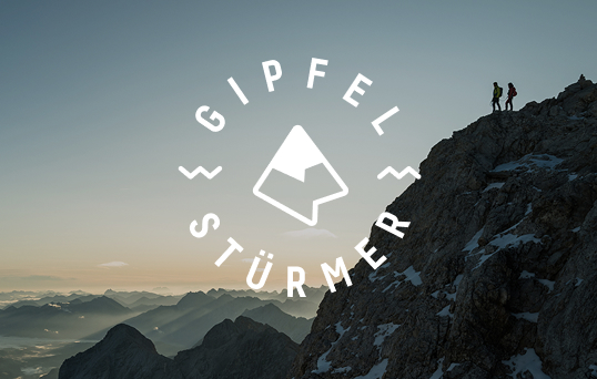 Bergpanorama und Gipfelstürmer Logo