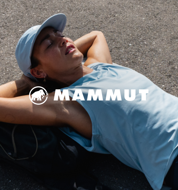 Frau mit Mammut Bekleidung und Mammut Logo