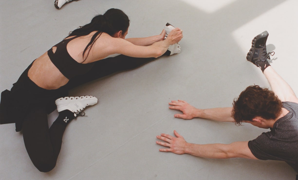 Personen beim Stretching