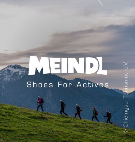 Gruppe Wanderer und Meindl Logo