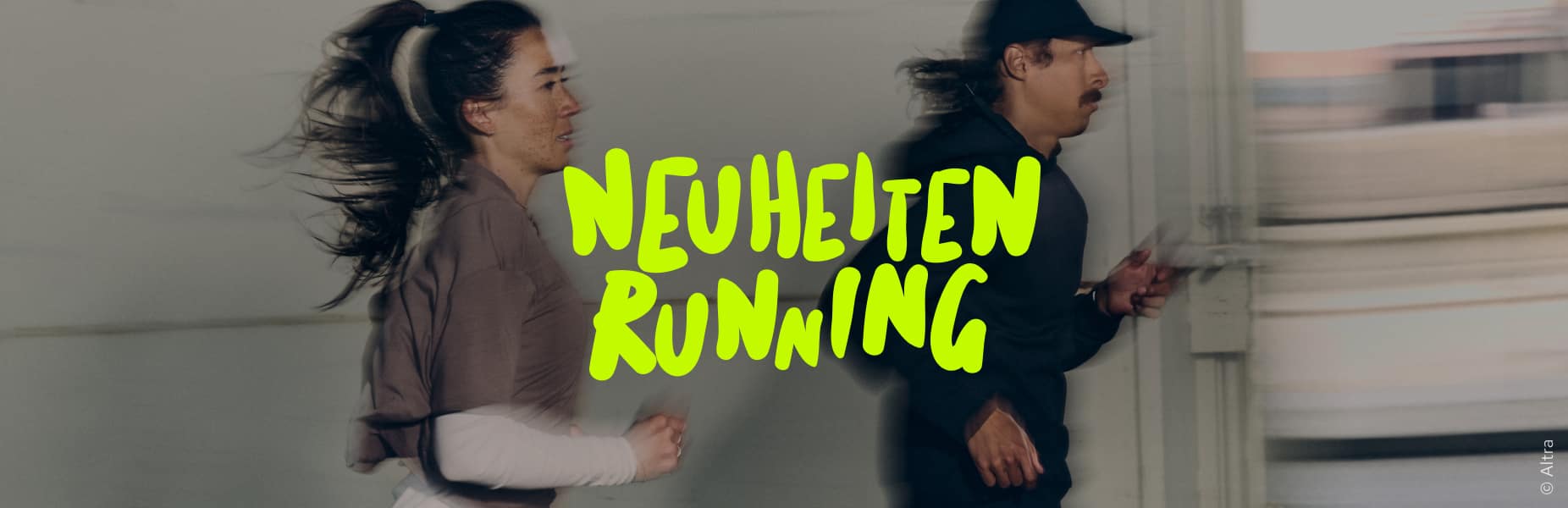 Zwei Läufer*innen und Aufschrift 