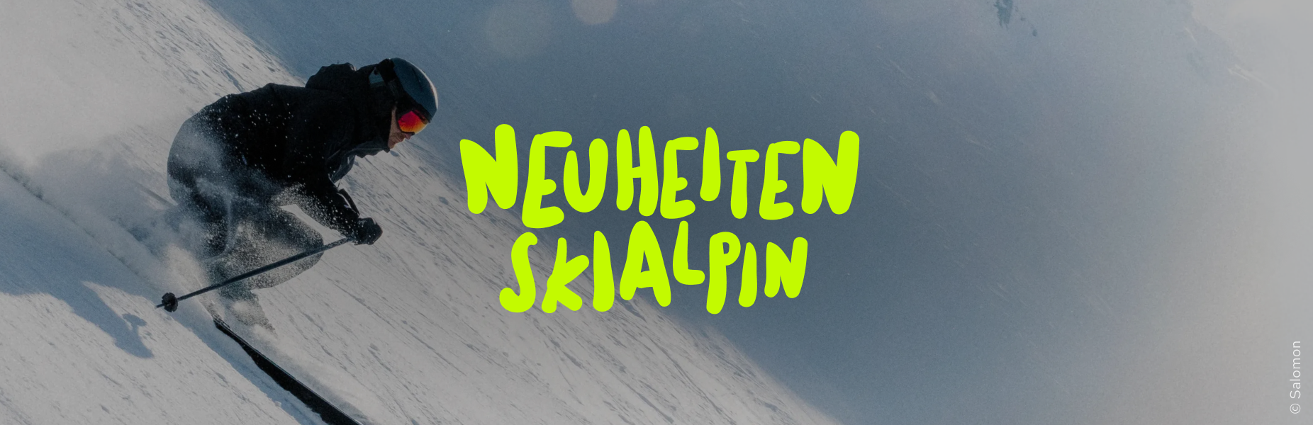 Skifahrer und Aufschrift 