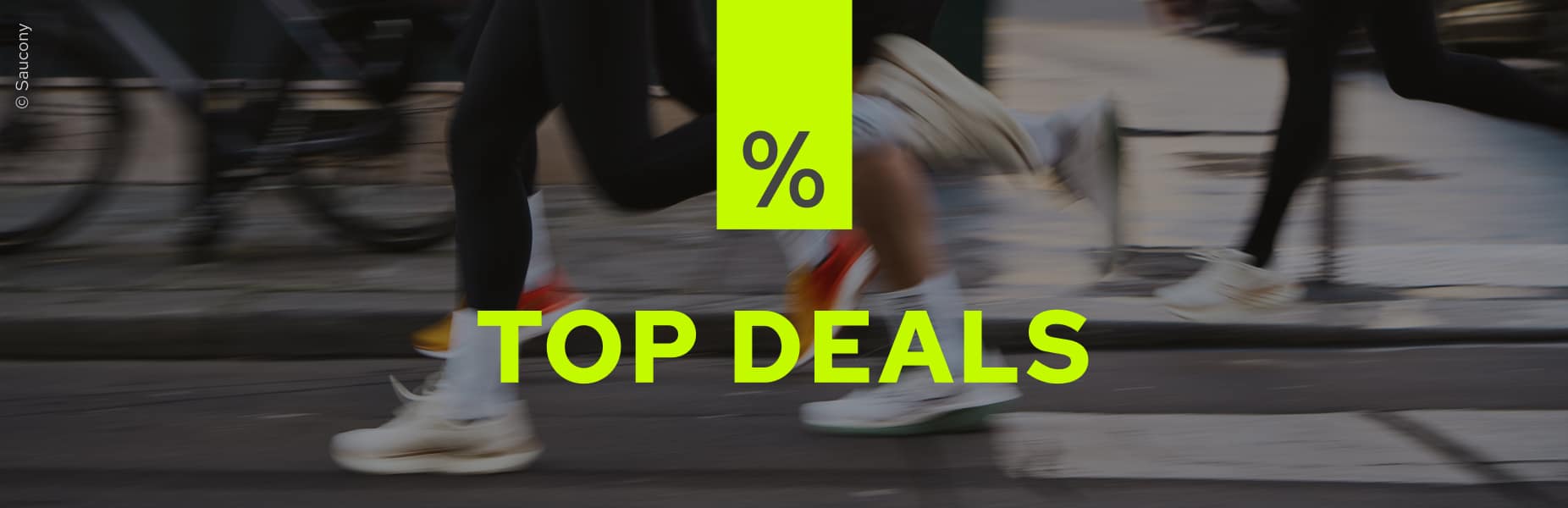 Laufende Personen und Aufschrift 