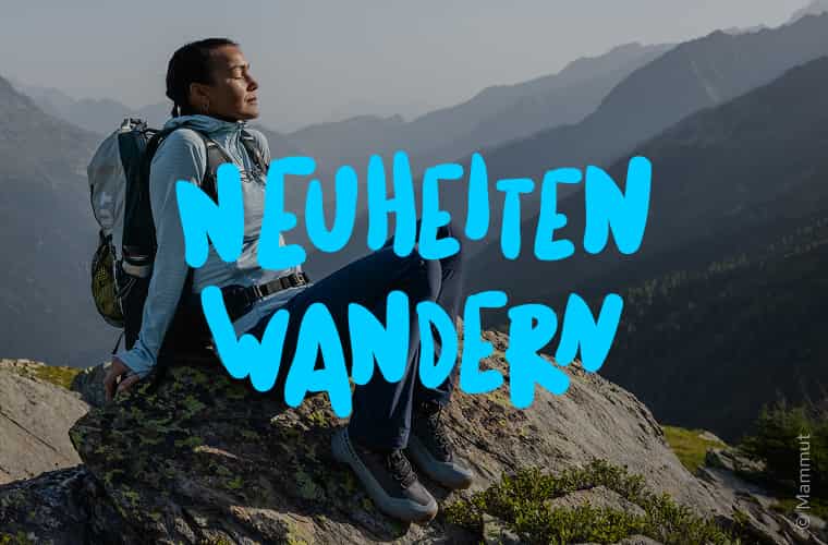 Wandererin in den Bergen mit Aufschrift 